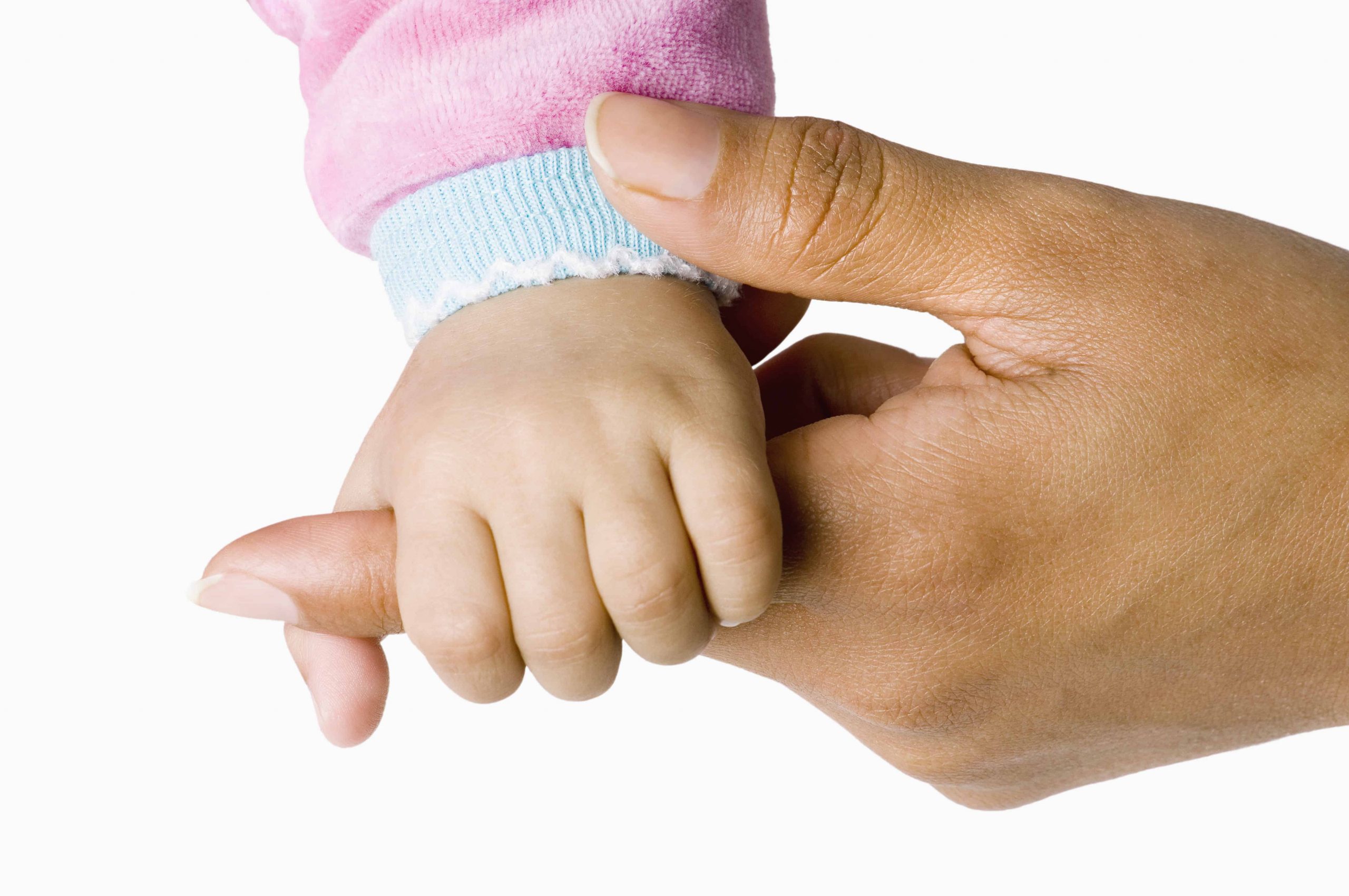 positive birth after miscarriage Mother holding her healthy daughter's hand after a positive and calmer birth